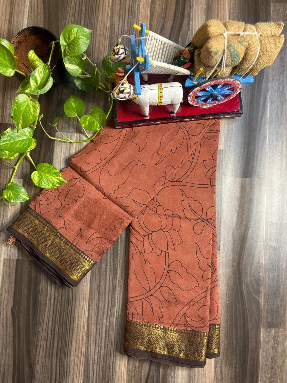 Rust Lotus Nizam Border Pure Kalamkari Saree